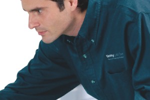 Unity Lab Services technician intently resolving a scientific instrument issue in the lab